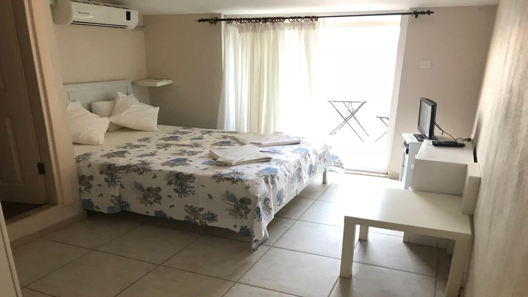 Kiyi Butik Pansiyon Rezervasyon